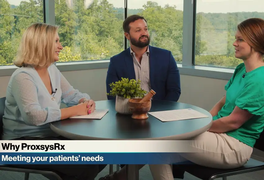 Healthcare professionals in discussion at ProxsysRx meeting about improving patient care needs.