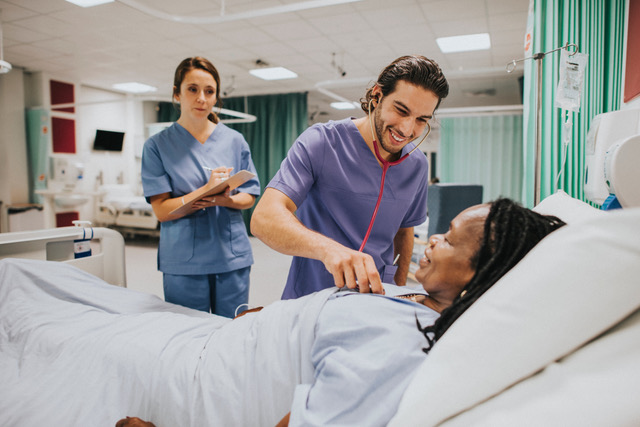 doctor examining patient