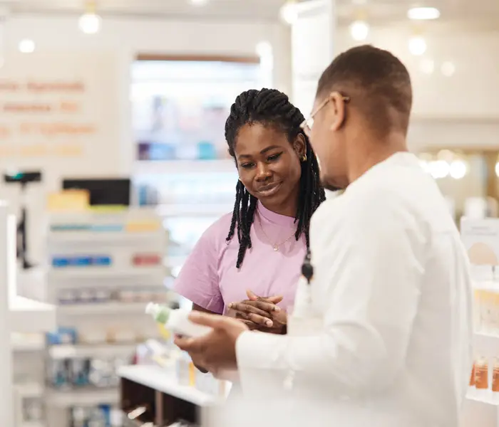 Pharmacist consulting customer